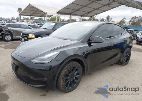 2023 Tesla Model Y Awd/Long Range Dual Motor All-Wheel Drive z USA, uszkodzony, nr VIN 7SAYGAEE7PF741916